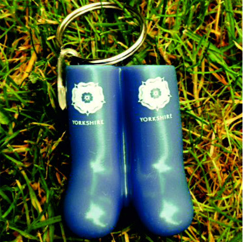 Keyring in the shape of a pair of blue wellies. Printed with the Yorkshire Rose