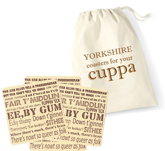 4 recycled cream leather coasters, printed with a Yorkshire Dialect design in brown, inside a cream cotton pouch also printed Yorkshire